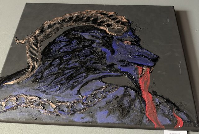 Textured painting on canvas of a blue and black goat-headed Krampus in profile with large ridged bronze horns, a long red tongue and a bronze chain across his chest, on a dark grey background